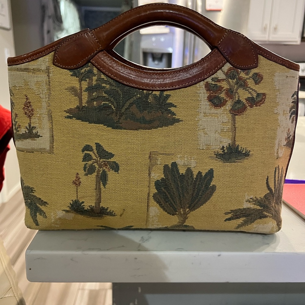 Tommy Bahamas brocade leather purse.